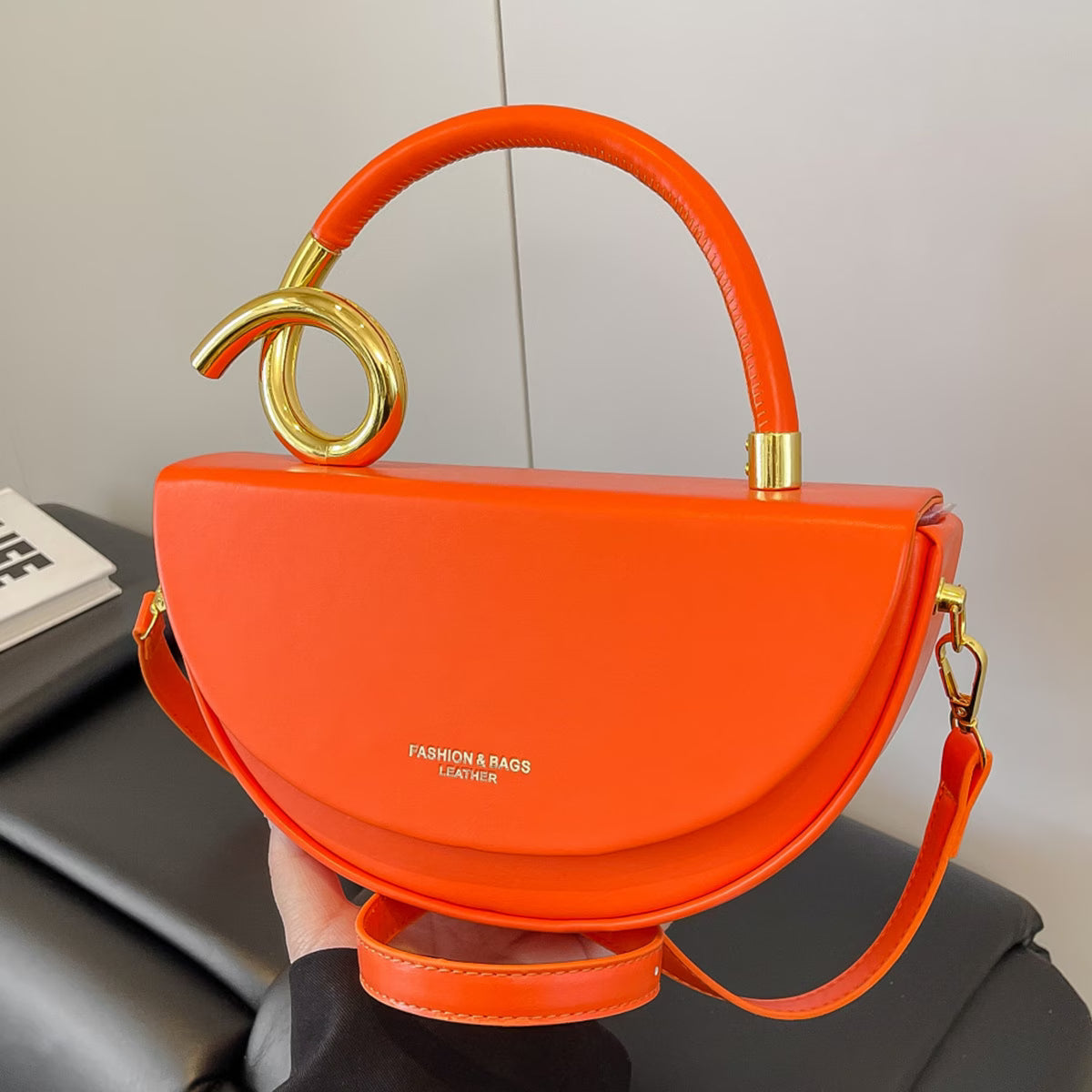 Gold Ring Handle Saddle Handbag
