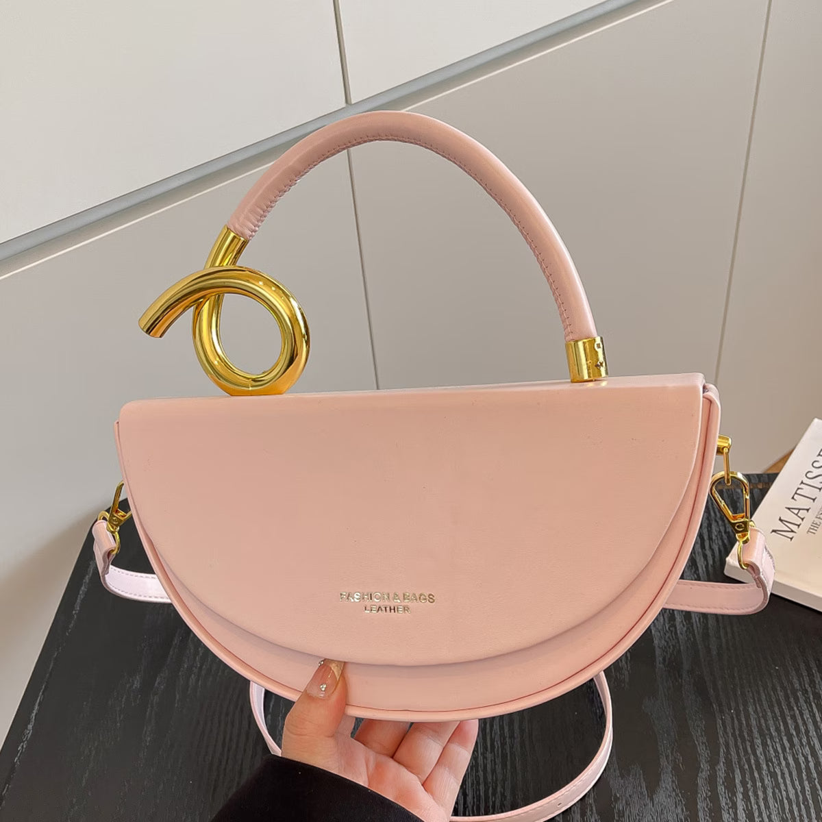 Gold Ring Handle Saddle Handbag