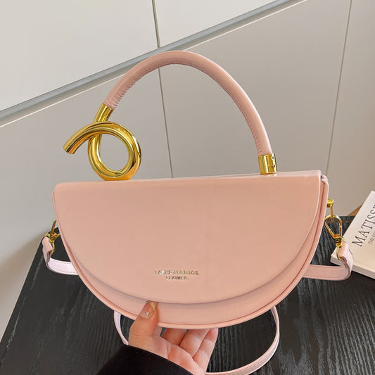 Gold Ring Handle Saddle Handbag