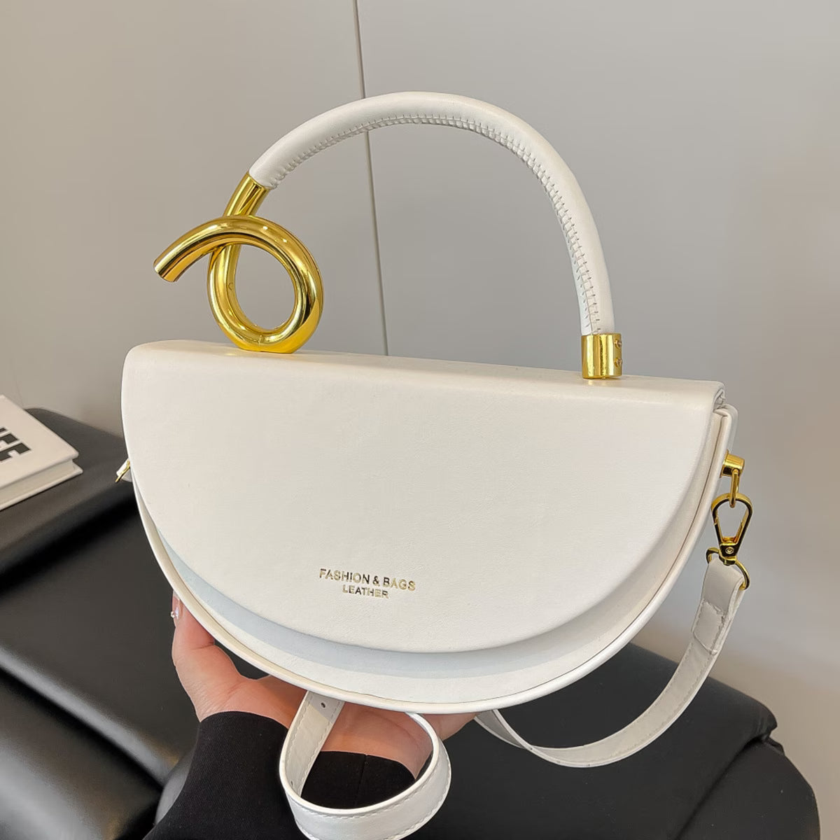 Gold Ring Handle Saddle Handbag