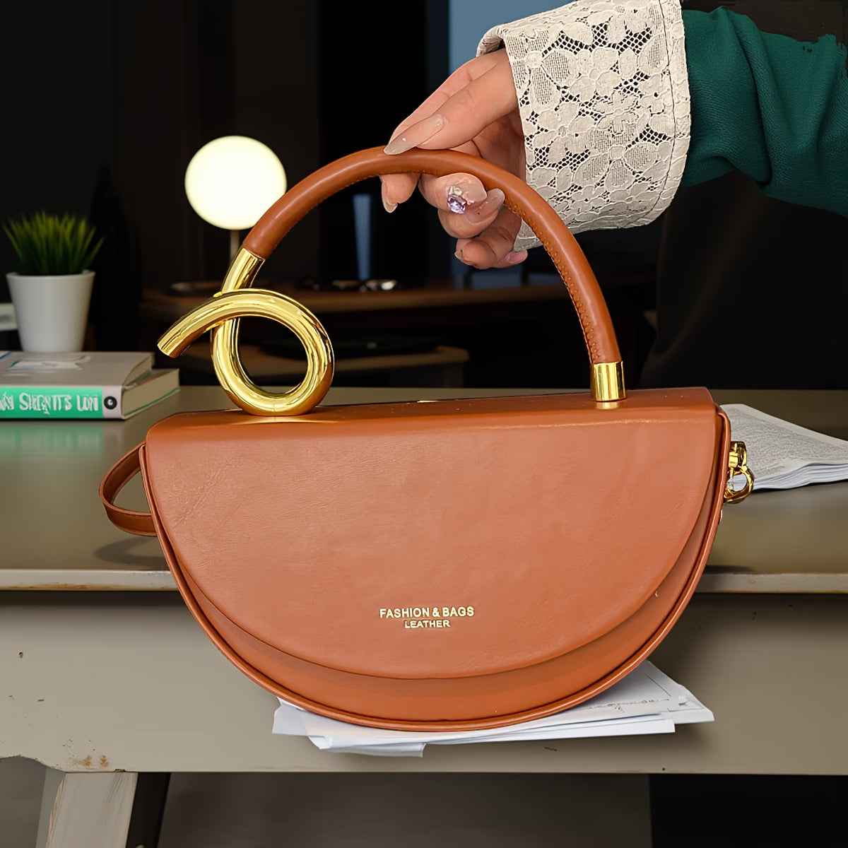 Gold Ring Handle Saddle Handbag